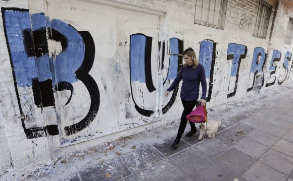 A woman in Buenos Aires walks