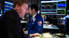 Traders work a floor for the ny Stock Exchange.