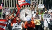 NY Boricuas Protest Hedge Fund Manager John Paulson’s